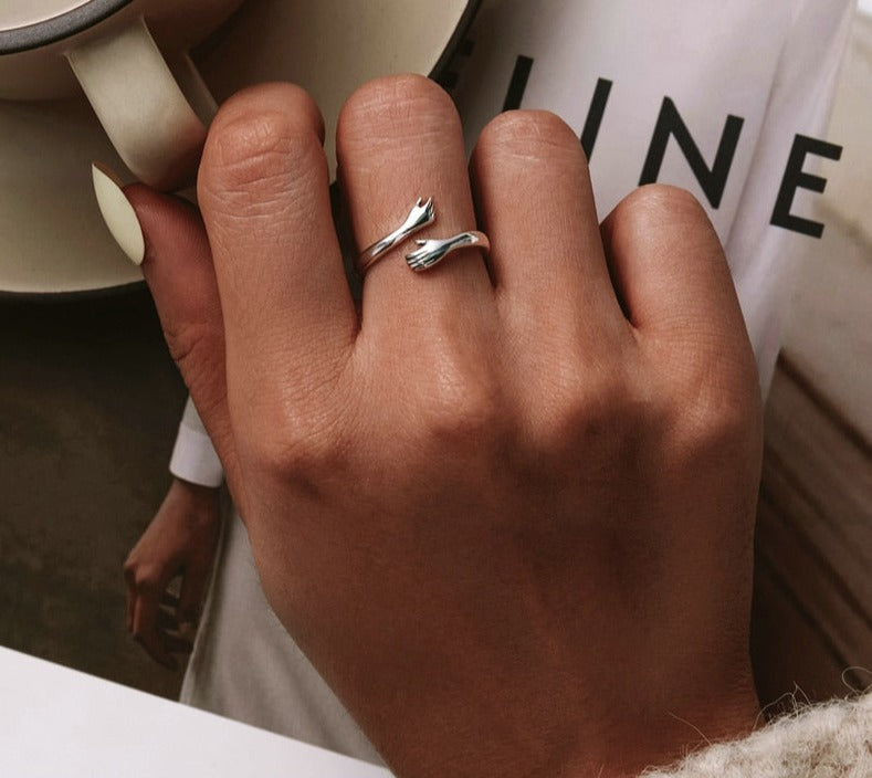 Kus en Knuffel Ring – Verstelbare Liefdesring met Symbolische Omhelzing