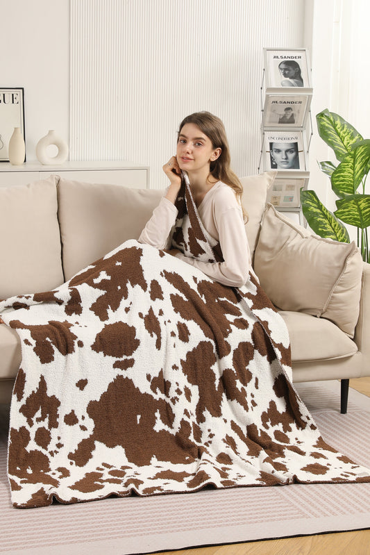 Koeienprint Fleece Deken – Zachte Luxe Woonplaid in Zwart of Bruin