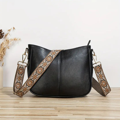 Vegan Leren Schoudertas met Brede Geprinte Band – Stijlvol & Comfortabel