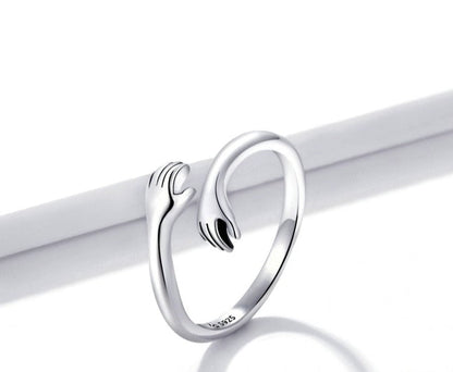 Kus en Knuffel Ring – Verstelbare Liefdesring met Symbolische Omhelzing