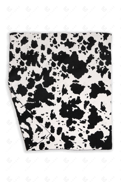 Koeienprint Fleece Deken – Zachte Luxe Woonplaid in Zwart of Bruin