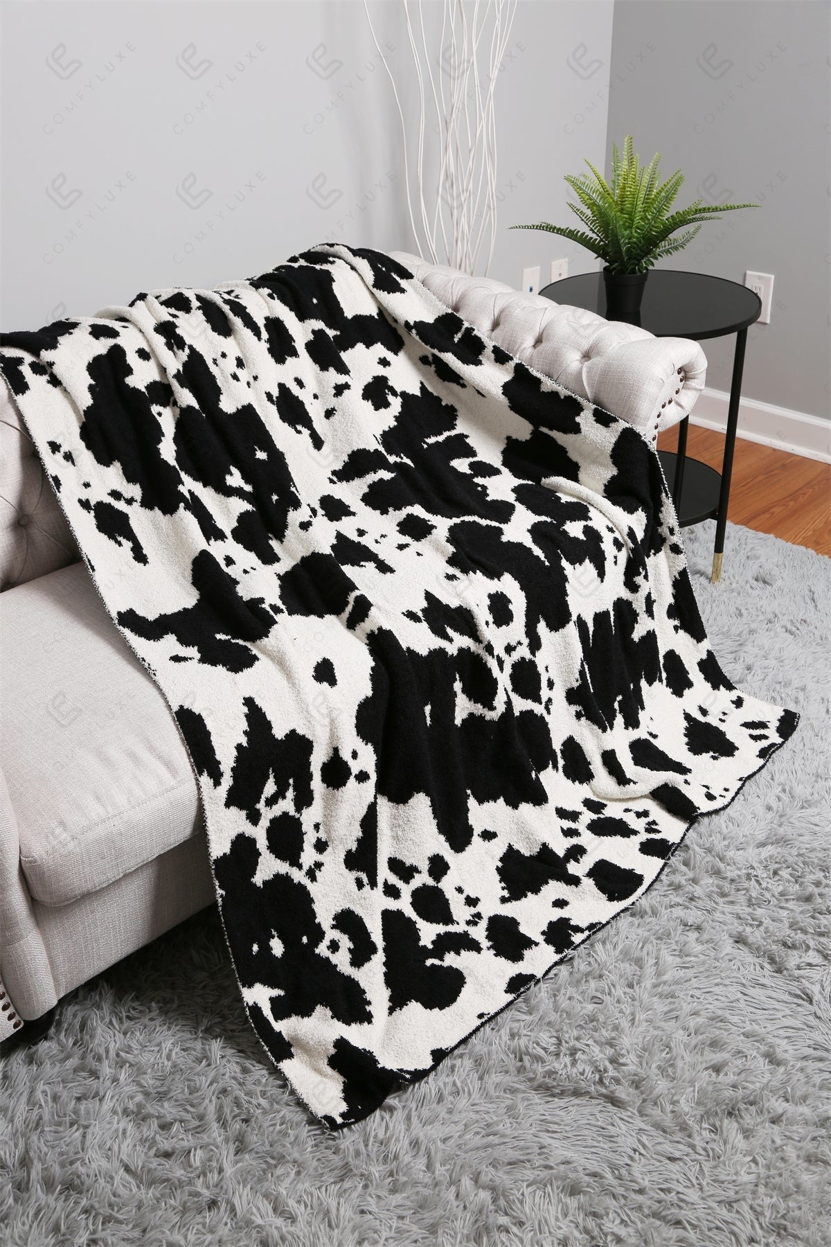 Koeienprint Fleece Deken – Zachte Luxe Woonplaid in Zwart of Bruin