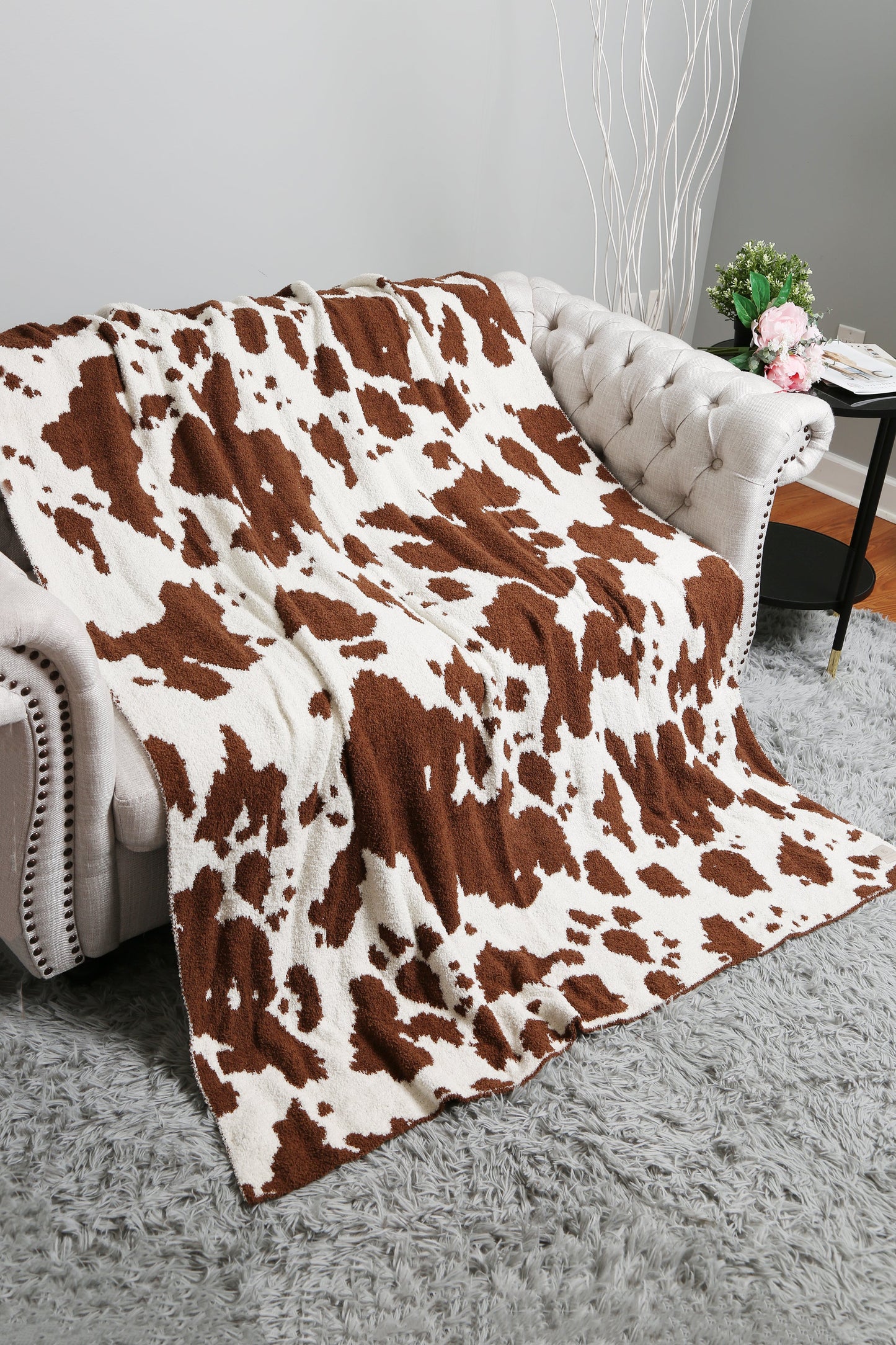 Koeienprint Fleece Deken – Zachte Luxe Woonplaid in Zwart of Bruin